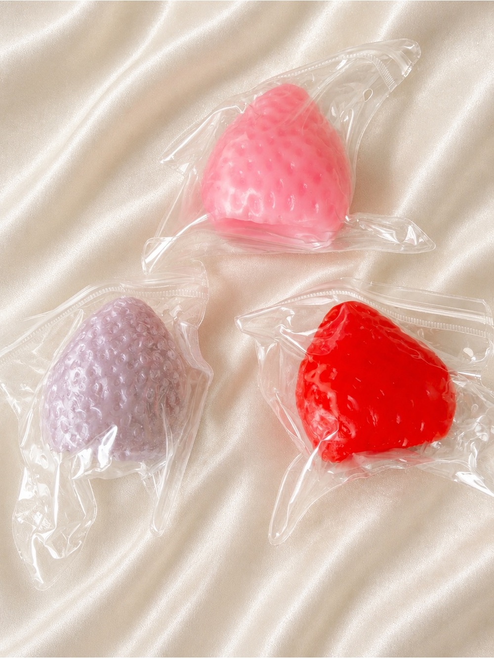 3 strawberry squishy pink and red